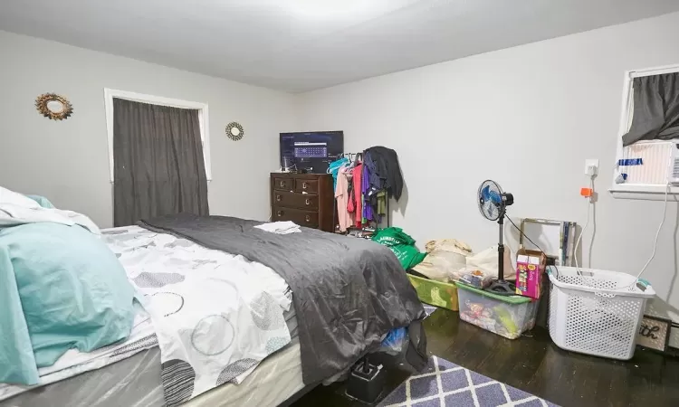 Bedroom featuring hardwood / wood-style floors