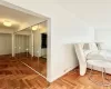 Bedroom featuring a closet and parquet floors