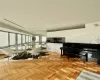 Misc room with light parquet floors