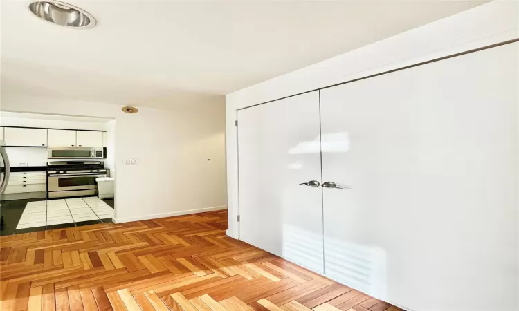 Hall featuring light parquet floors