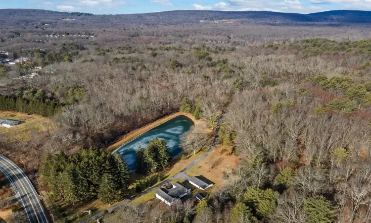 Aerial view with a water and mountain view