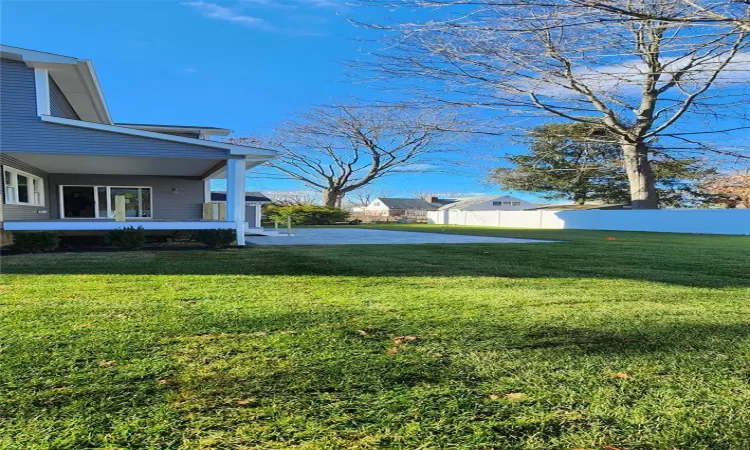 View of yard with a patio area