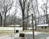 View of yard layered in snow