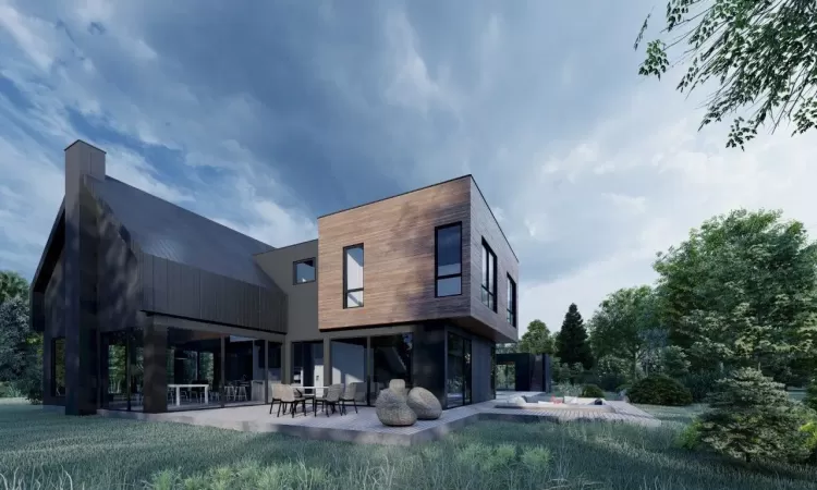 Rear view of house with a patio area and a yard