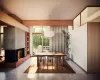 Dining room featuring a fireplace and built in features