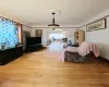 Living room with light hardwood / wood-style flooring