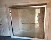 Bathroom featuring walk in shower