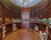 Wine room with wood-type flooring