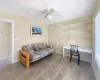 Living area featuring ceiling fan