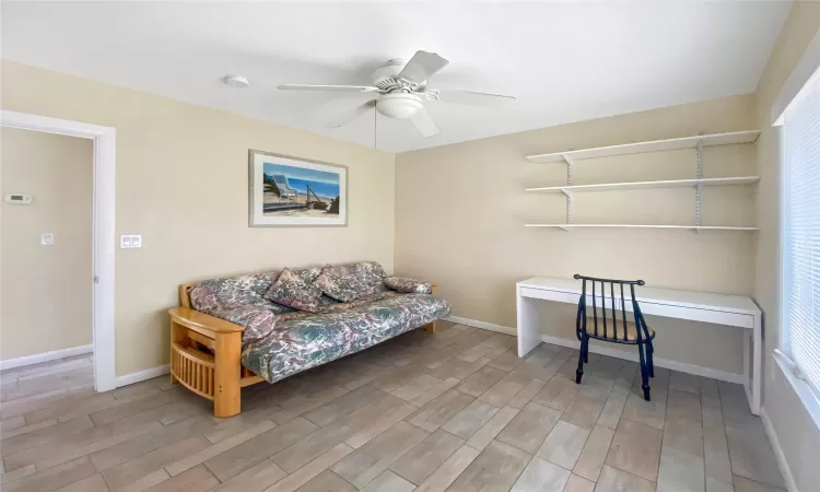 Living area featuring ceiling fan