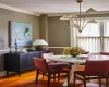 Dining area featuring wood-type flooring and ornamental molding