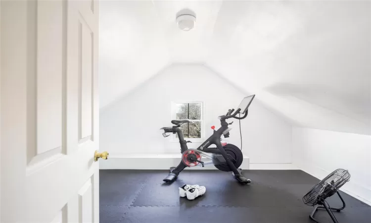 Exercise room with lofted ceiling