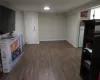 Kitchen featuring dark wood-type flooring