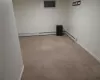 Unfurnished room with light colored carpet