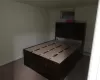 Bedroom with light carpet