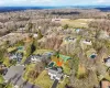 View of community featuring a gazebo, basketball court, and a yard