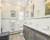 Bedroom featuring ceiling fan, crown molding, and light hardwood / wood-style flooring