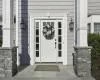 View of front of house with a garage and a front lawn