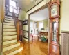 Staircase featuring parquet flooring and crown molding