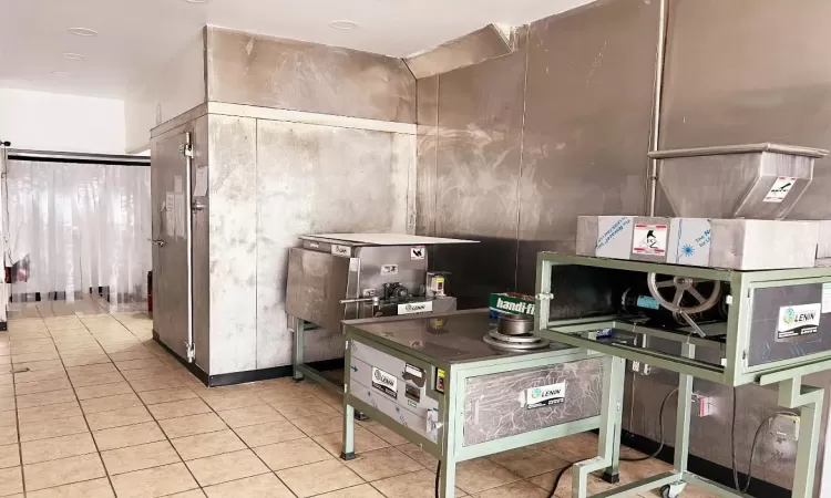 Kitchen featuring light tile patterned flooring