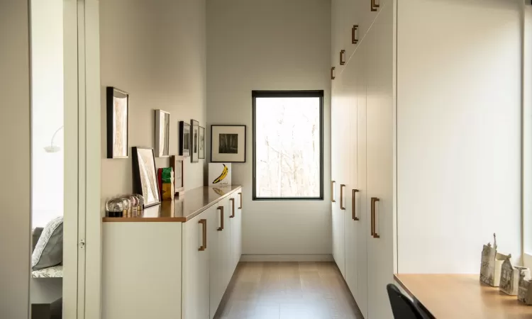 Hallway featuring light wood-type flooring