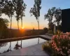 View of pool at dusk