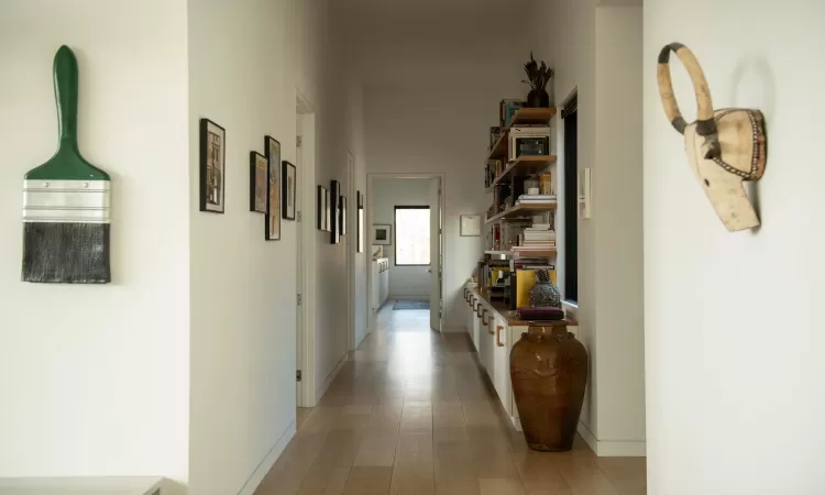 Hallway featuring light hardwood / wood-style flooring