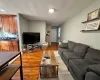 Living room with light hardwood / wood-style flooring