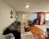 Living room with light wood-type flooring