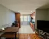 Kitchen featuring light hardwood / wood-style floors, stainless steel appliances, and radiator