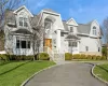 View of front of property with a front lawn