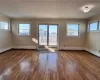 Living Rm/Dining Area with hardwood / wood-style floors and ornamental molding