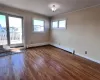 Dining Area featuring crown molding, hardwood / wood-style floors, and plenty of natural light