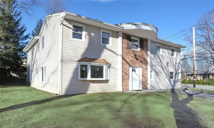 View of front of home with a front lawn