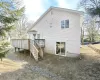 Back of house with a wooden deck