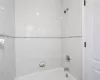 Bathroom with tiled shower / bath