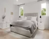 Bedroom with light hardwood / wood-style floors