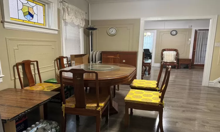 Dining space featuring wood-type flooring