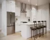 Kitchen featuring stainless steel refrigerator, sink, wall chimney exhaust hood, hanging light fixtures, and tasteful backsplash