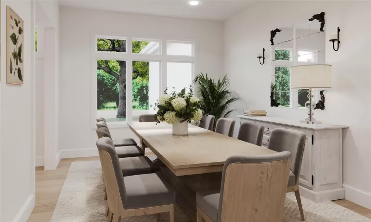 Dining area with light hardwood / wood-style floors