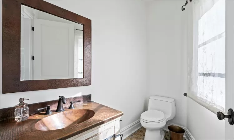 Bathroom with vanity and toilet