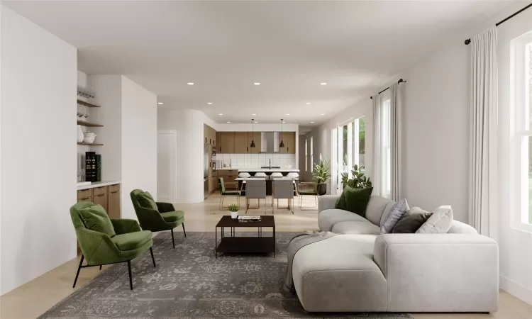 Living room featuring light wood-type flooring and sink