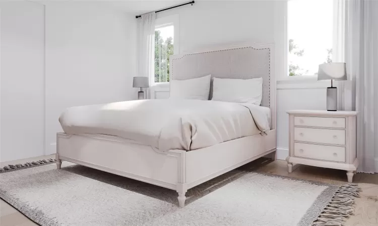 Bedroom featuring multiple windows and hardwood / wood-style floors