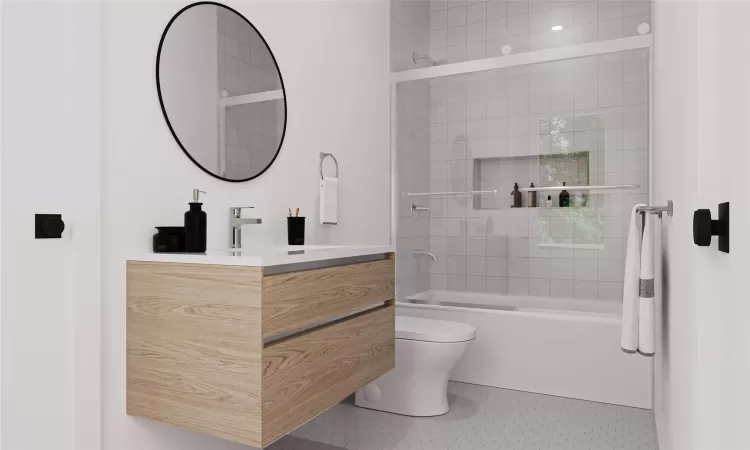 Full bathroom featuring tile patterned floors, shower / washtub combination, vanity, and toilet