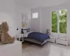 Bedroom with light wood-type flooring and radiator