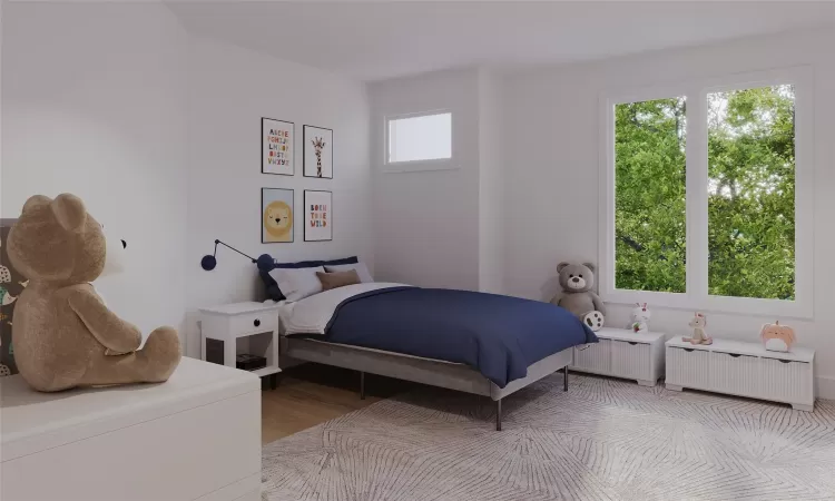 Bedroom with light wood-type flooring and radiator