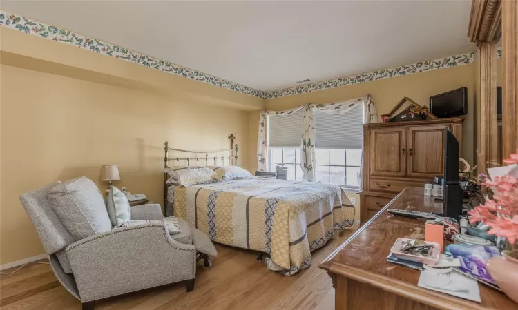 Bedroom featuring light wood-type flooring