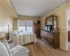 Bedroom with light hardwood / wood-style floors