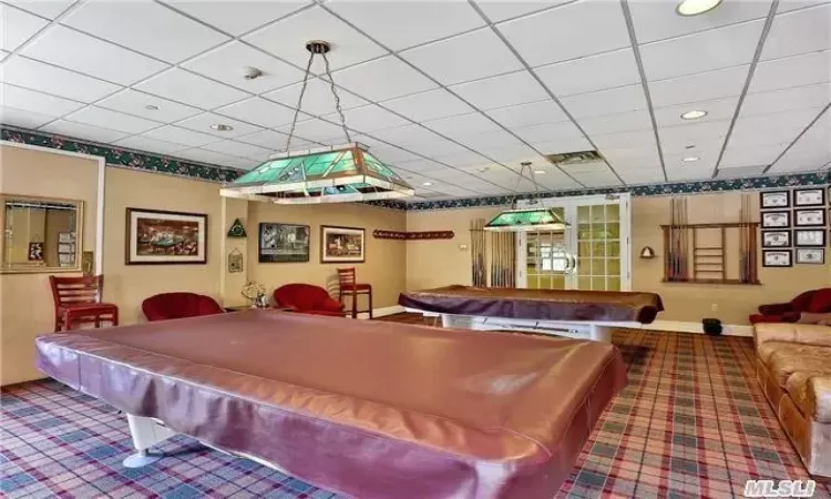 Game room featuring carpet, a drop ceiling, and pool table