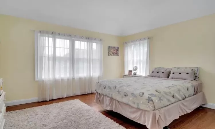 Bedroom featuring hardwood flooring